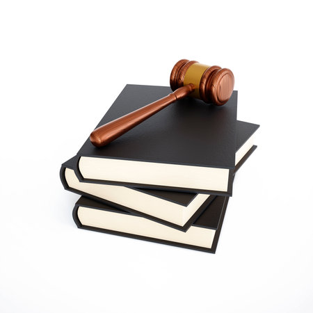 Judge gavel with books isolated on white backgroundの写真素材