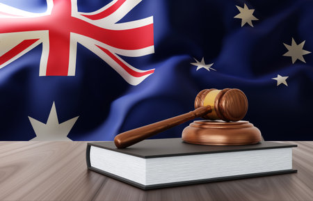 Judge gavel on the desk on background of Australia flagの写真素材