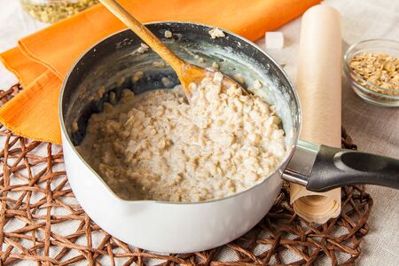 delicious, ingredient, gourmet, dinner, eating, cereal, white, background, wooden, milk, fresh, bowl, breakfast, cooking, diet, food, healthy, kitchen, meal, napkin, natural, organic, paper, rustic, seeds, spoon, sugar, table, woodの写真素材