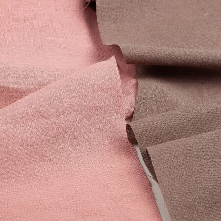 Red and baige linen fabric texture closeupの写真素材
