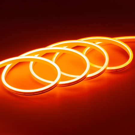 Flexible orange led neon decor christmas light on black backgroung.の写真素材