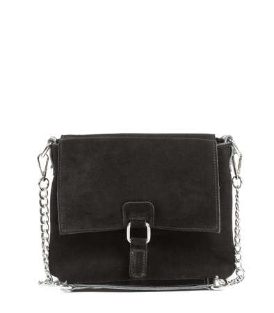Classic fashion black leather women's bag with metal chain on a white background.の写真素材