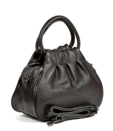 Classic fashion black leather women's handbag on a white background.の写真素材