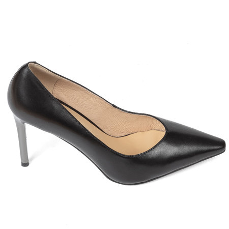 Black women's classic shoes with a sharp toe with thin heels on a white background.の写真素材