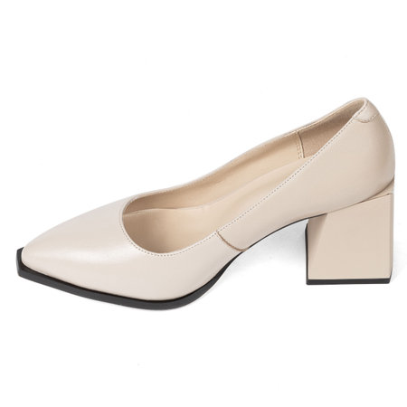 Beige comfortable office women's shoes with black sole with thick heels and a sharp nose on a white background.の写真素材