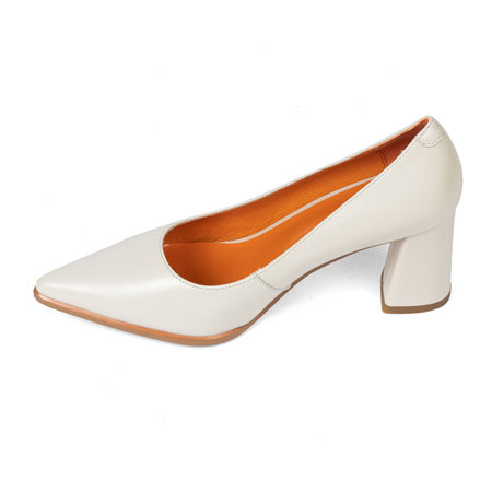 Beige comfortable office women's shoes with black sole with thick heels and a sharp nose on a white background.の写真素材