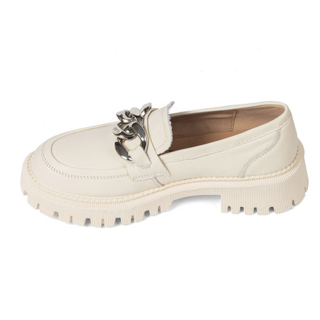 Beige women's leather ankle boots on a thick rubber sole decorated with a metal chain on a white background.の写真素材