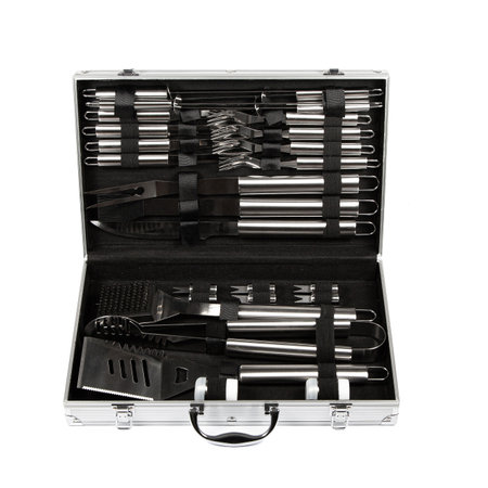 New barbecue set with skewers, forks and knives in an aluminum suitcase with a handle on a white background.の写真素材