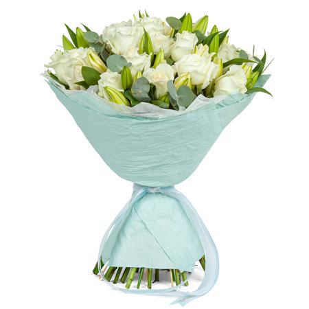 White wedding bouquet in blue paper cone isolated on white.の写真素材