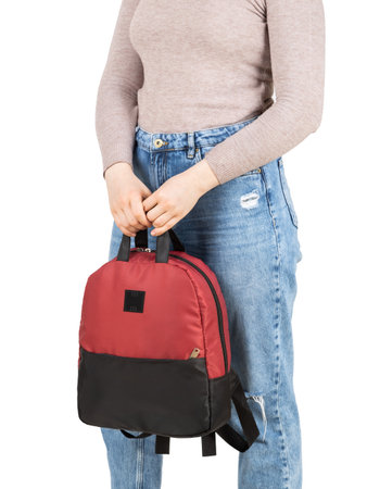 Woman in casual clothing with backpack bag isolated on white background.の写真素材