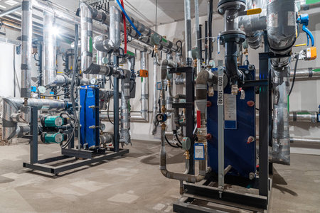 Modern industrial building with pipes, heat exchangers and valves.の写真素材