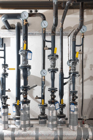 Modern industrial building with pipes, heat exchangers and valves.の写真素材