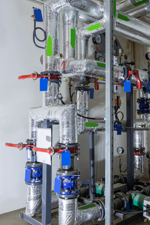 Modern industial pumping station with heal exchangers and valves.の写真素材