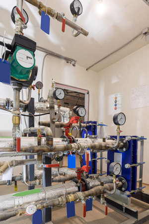 Modern industial pumping station with heal exchangers and valves.の写真素材