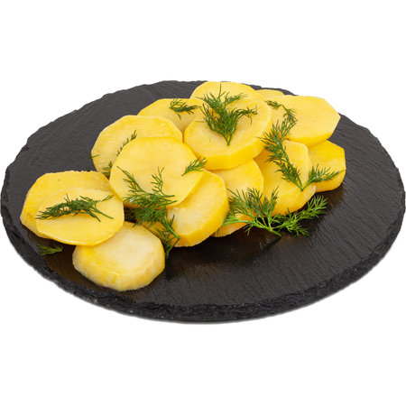 Slices of boiled potatoes with dill on a plate on a white backgroundの写真素材