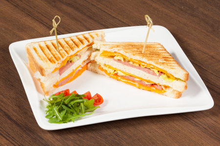 Club sandwich with cheese and ham.の写真素材