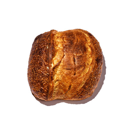 This image shows a delightful closeup of a scrumptious cinnamon roll beautifully presented against a...