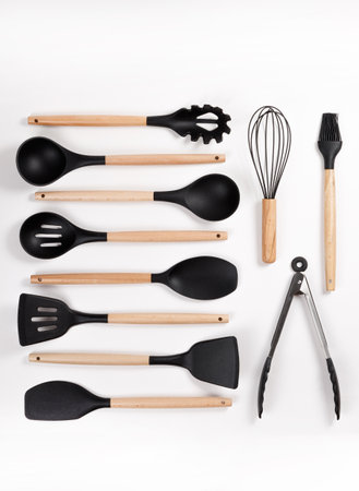 This is a beautifully crafted set of sleek black kitchen utensils, thoughtfully designed with...