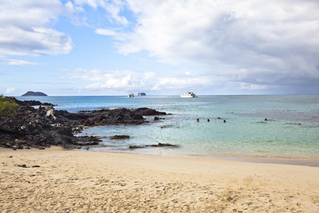 Bachas Beach has beautiful corners of sand and volcanic rock Where many tourists arrive, Santa Cruz Island, Galapagosの写真素材