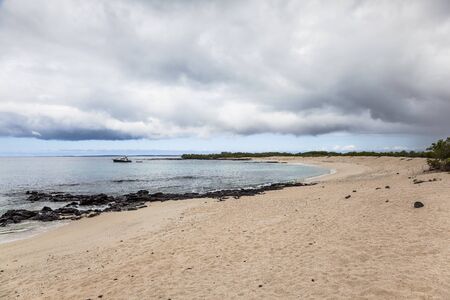 Bachas Beach has beautiful corners of sand and volcanic rock where many tourists arrive, Santa Cruz Island, Galapagosの写真素材