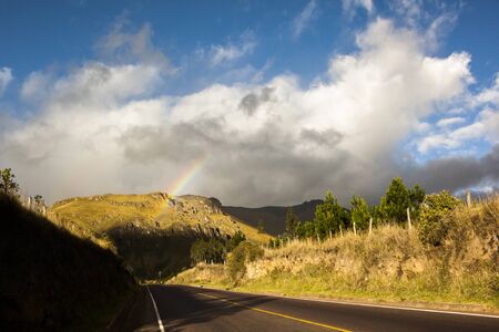 rainbow, clouds and mountainsの写真素材