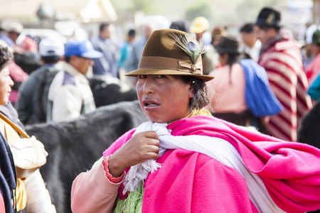 Indian woman wearing pink poncho and hatのeditorial素材