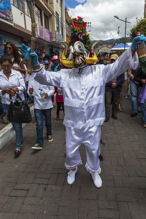 PÃ­llaro, ECUADOR - FEBRUARY 6, 2016: Unknown locals dressed up participating in the Diablada, popular town celebrations with people dressed as devils dancing in the streetsのeditorial素材
