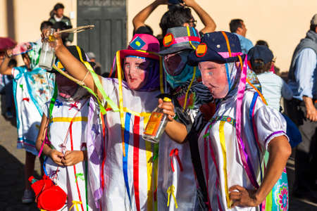 PÃ­llaro, ECUADOR - FEBRUARY 6, 2016: Unidentified people wearing costumes and masks in diabladas of Pillaroのeditorial素材