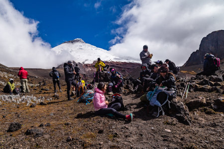 Morurco, Ticatilin, Ecuador, January 22, 2020: A group of climbers from the "walkers" group take a break during the steep trek to Morurco on a sunny day in Januaryのeditorial素材