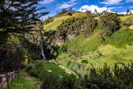 Paluz waterfall in the surroundings of the city of San Gabriel, province of Carchi, beautiful waterfall in the middle of Andean vegetationの写真素材