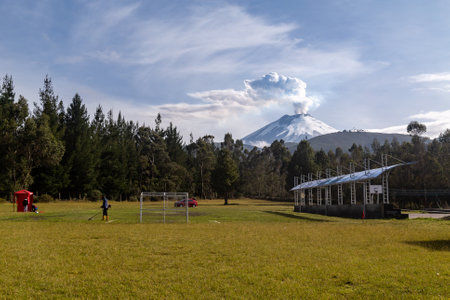 Cotopaxi in eruption, an immense column of steam rises a few thousand meters above the volcano.の写真素材