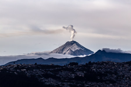 View of the Cotopaxi volcano from the city of Quito in its days of activityの写真素材
