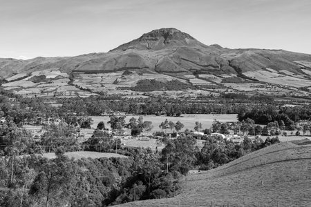 CorazÃ³n Volcano, Andean landscape with its crop fields and mountains showing their greenery on a clear morningの写真素材
