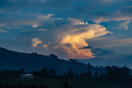 Beautiful cumulus clouds with blue background in dramatic sunsetの写真素材