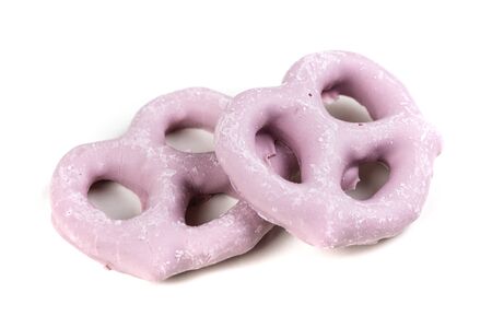 Raspberry yogurt covered pretzels isolated on a white backgroundの写真素材