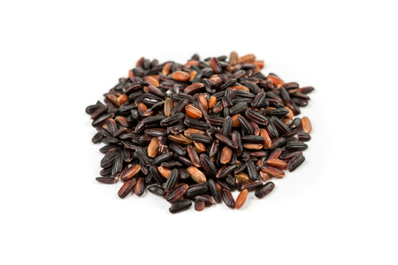 Japonica black rice isolated on white backgroundの写真素材
