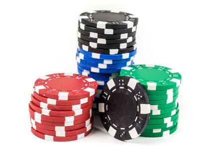 Stacks of poker chips isolated on white backgroundの写真素材