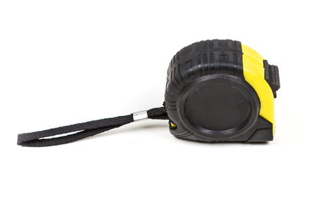 Black and yellow measuring tape isolated on white backgroundの写真素材