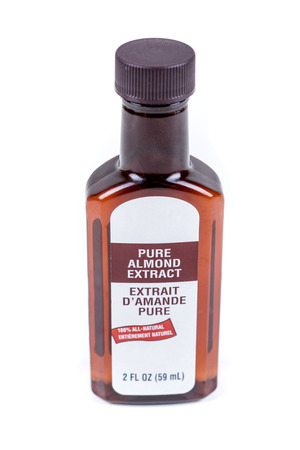 Pure almond extract isolated on white backgroundの写真素材