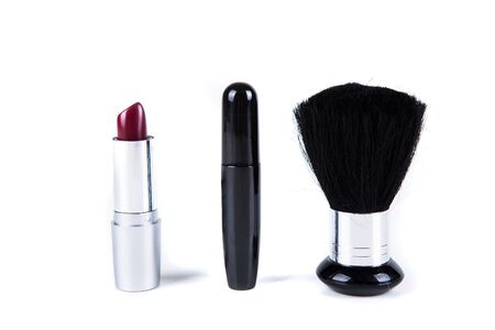 Makeup brush, lipstick and mascara isolated on white backgroundの写真素材