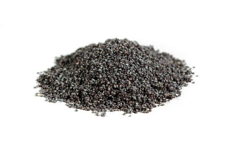 Hand selected poppy seeds  isolated on whiteの写真素材