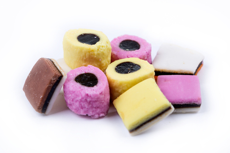 Assorted flavored licorice candy isolated on white backgroundの写真素材