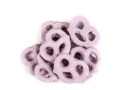 Raspberry yogurt covered pretzels isolated on a white backgroundの写真素材