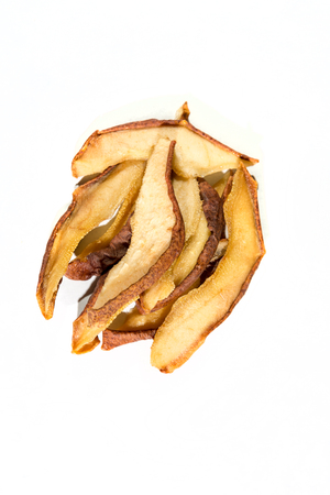 Hand picked home dried pear slices  isolated on whiteの写真素材