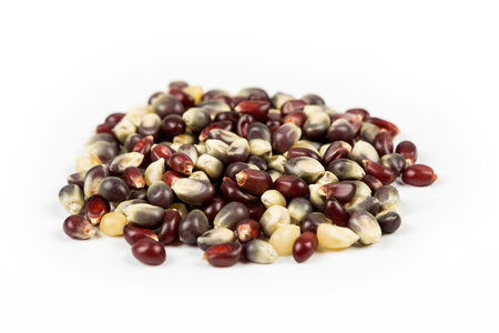Tricolor popcorn mix isolated on white backgroundの写真素材