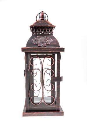 Aged bronze antique lantern isolated on white backgroundの写真素材