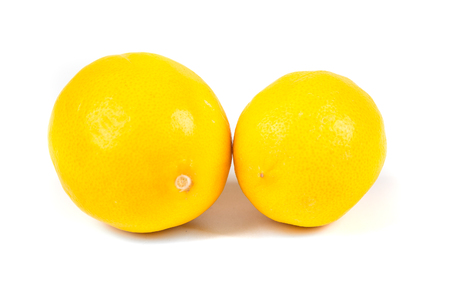 Two meyer lemons isolated on white backgroundの写真素材