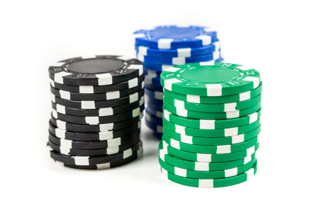 Stacks of poker chips isolated on white backgroundの写真素材