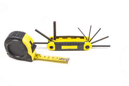 Measuring tape and hex wrench set isolated on white backgroundの写真素材