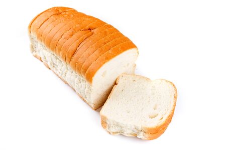 Loaf of whole grain bread isolated on white backgroundの写真素材